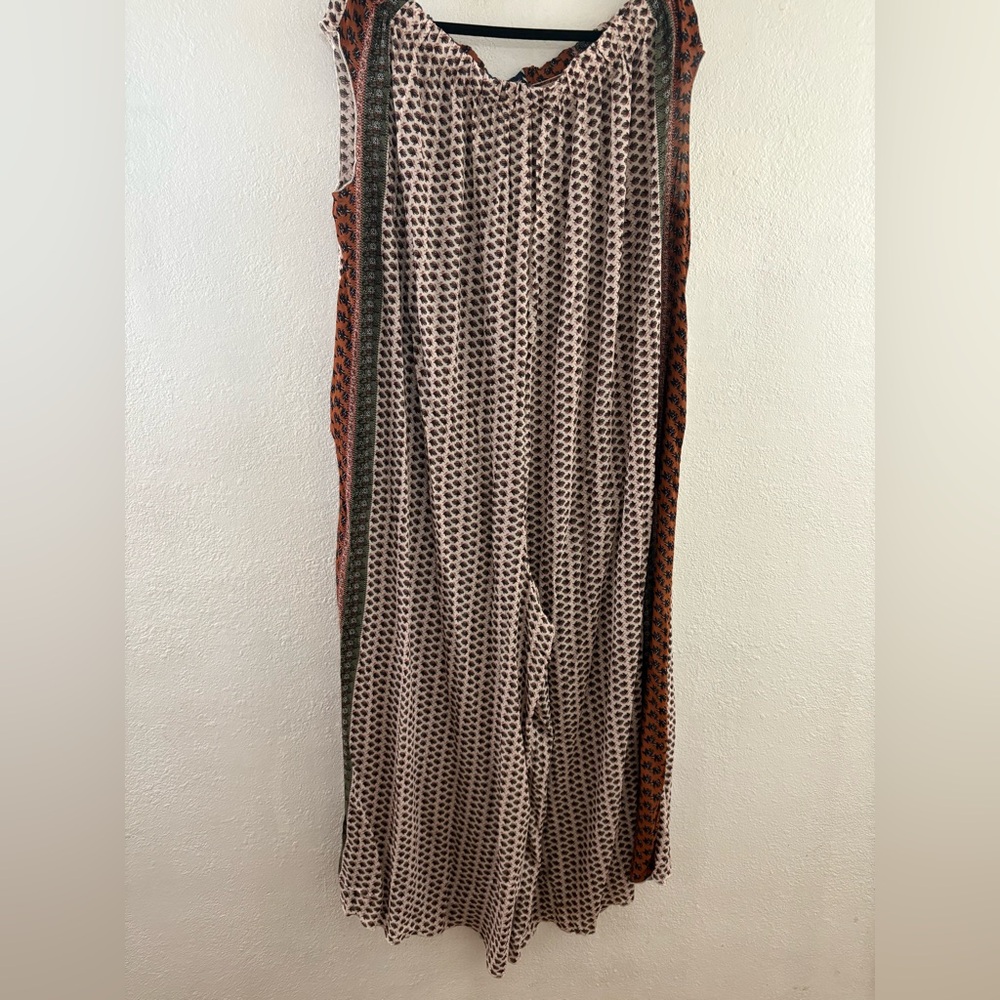 Miguel Torres design with contrasting side panels romper size M/L.